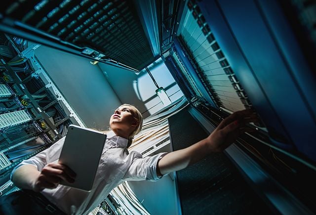 engineer in network server room