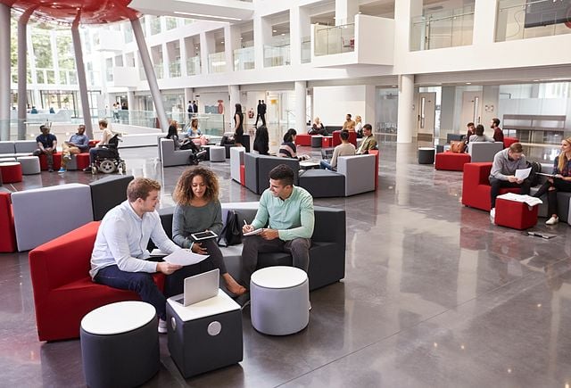 students-sitting-in-university-atrium-640x435